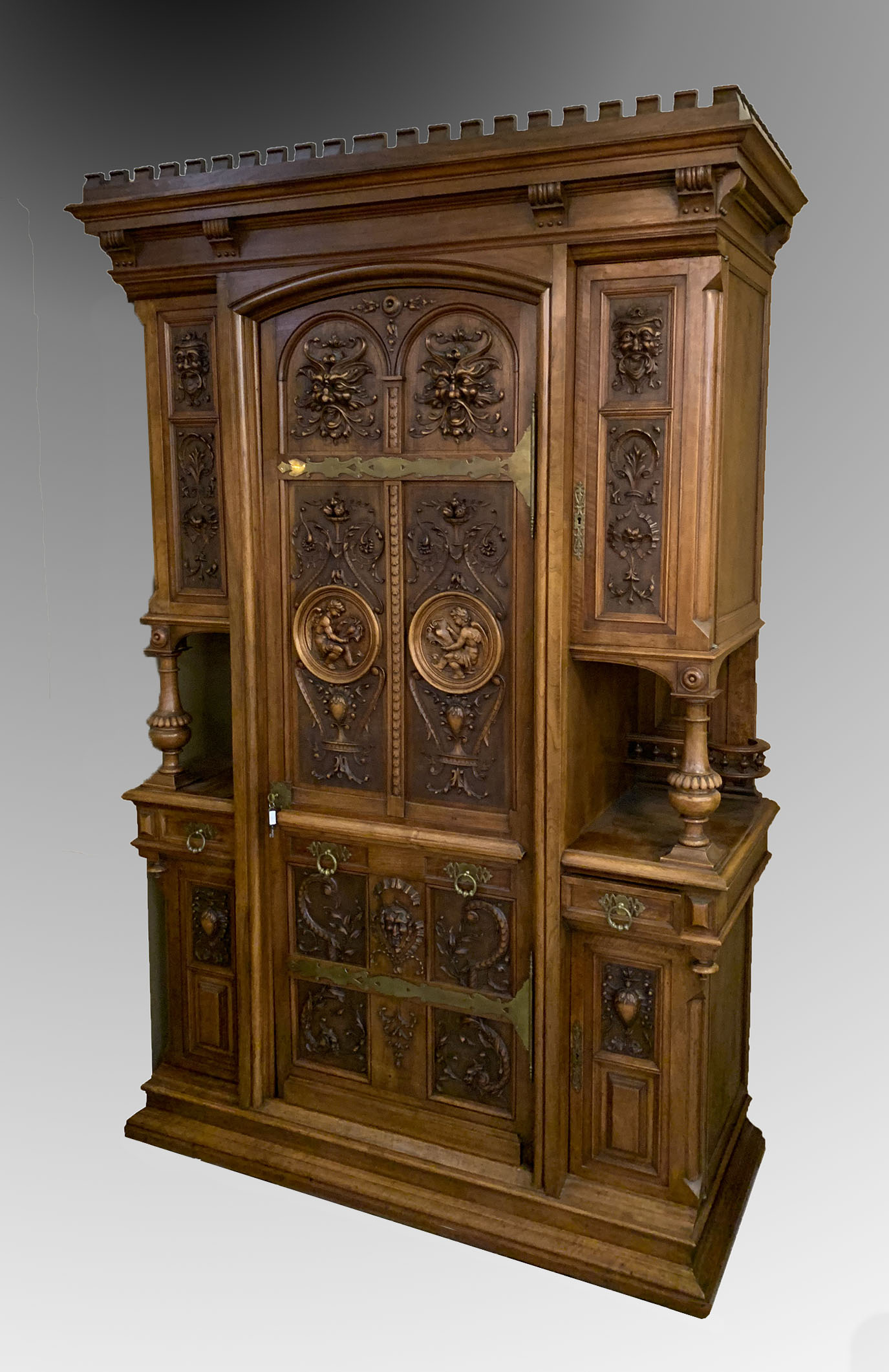 Appraisal: THE BEST CARVED WALNUT SINGLE DOOR ARMOIRE ETAGERE Elaborately carved