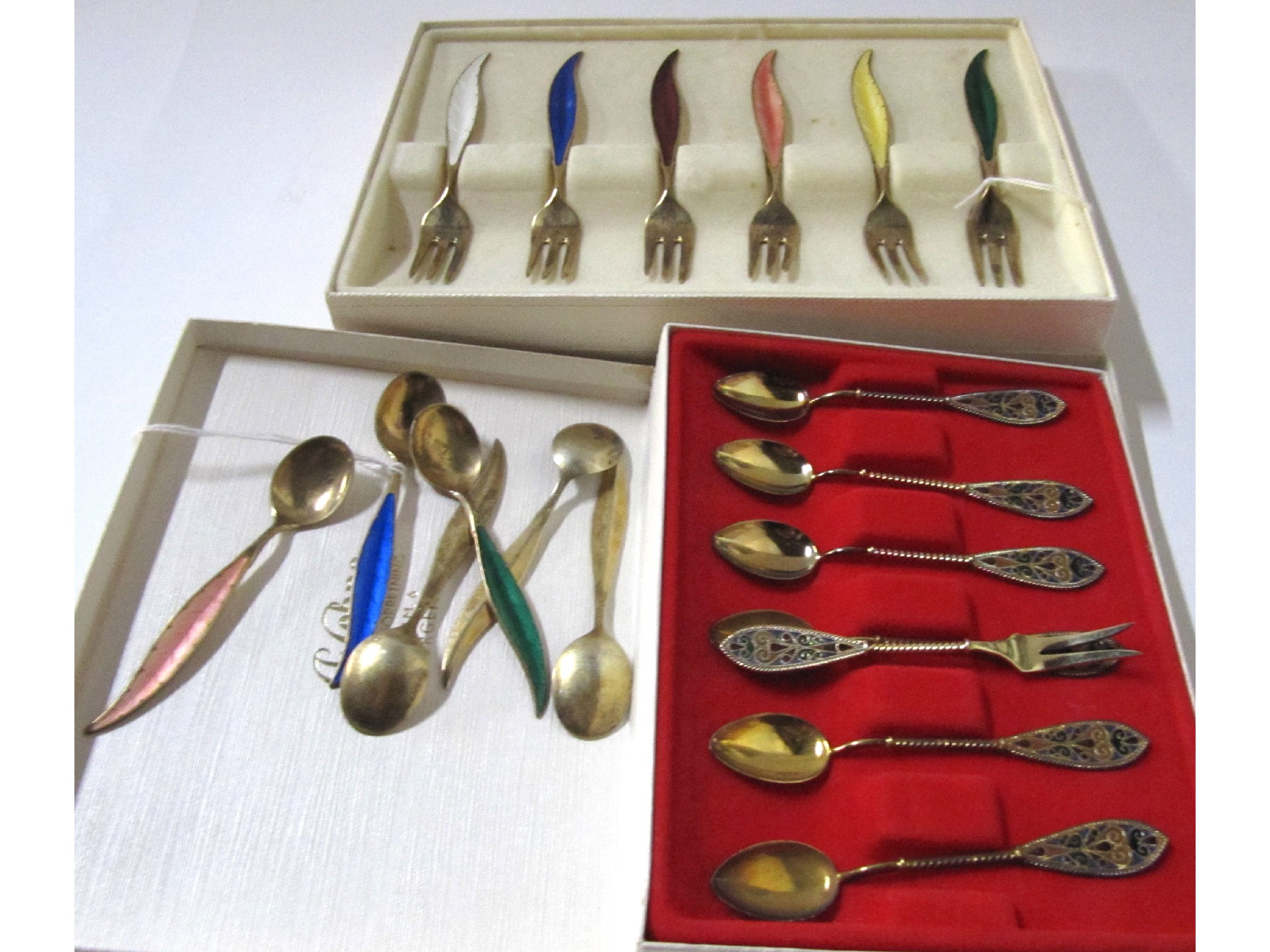 Appraisal: A lot comprising a cased set of sterling silver gilt