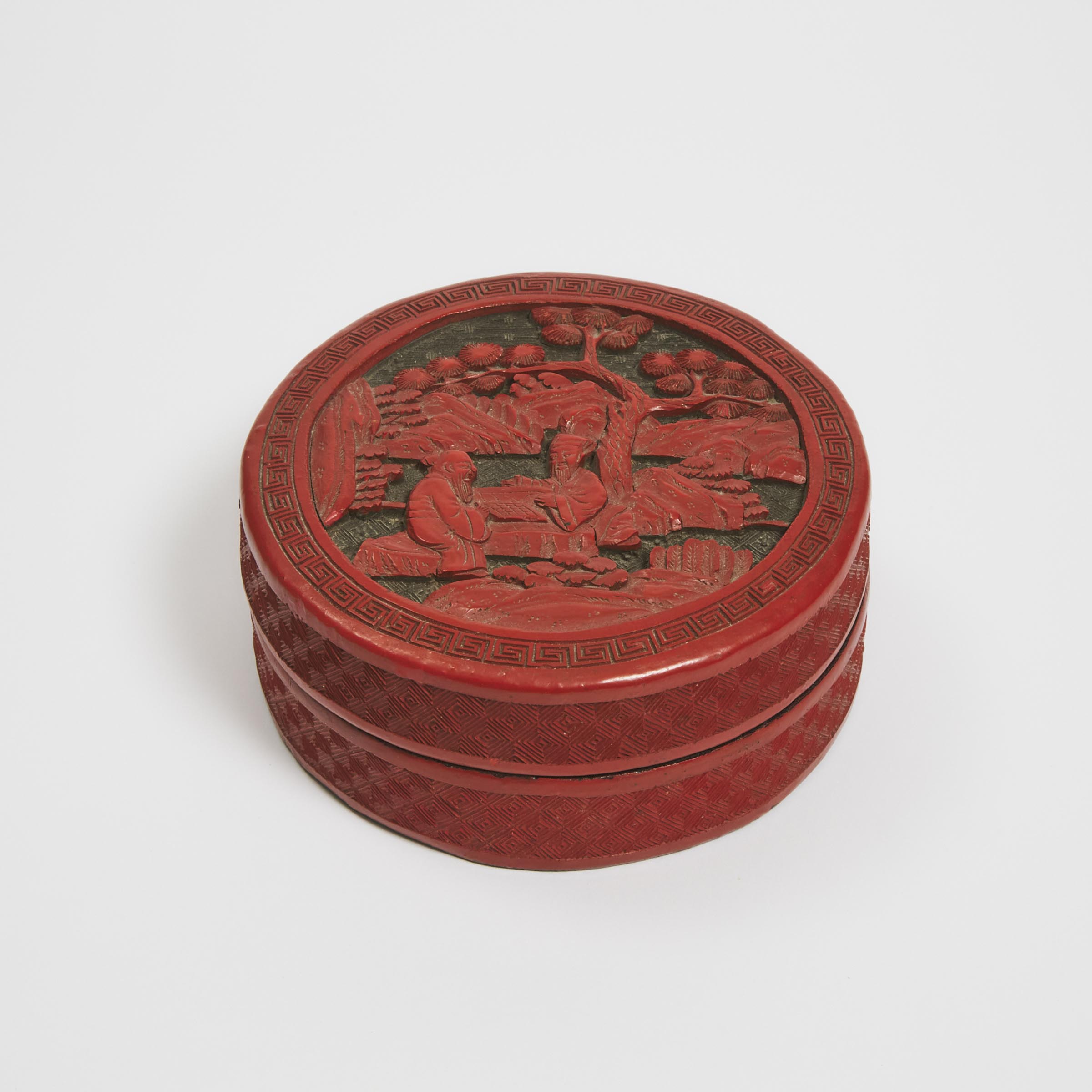 Appraisal: A Carved Cinnabar Lacquer Circular Box and Cover Early th