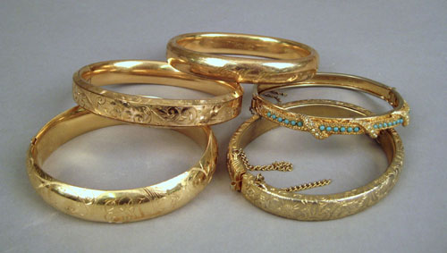 Appraisal: Five yellow gold bangle bracelets to include gold filled and