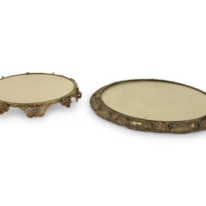 Appraisal: Two Silvered Metal Mirrored Plateaus th Century Diameter of larger