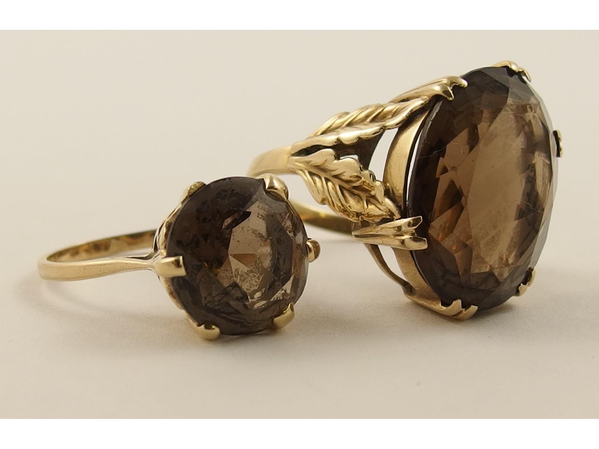 Appraisal: Two ct smoky quartz rings