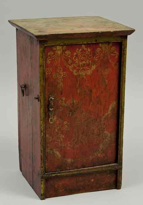 Appraisal: A painted Tibetan style pedestal cupboard gilt painted on a