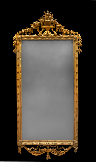 Appraisal: Large Carved Giltwood Looking Glass in the th-century neoclassical style