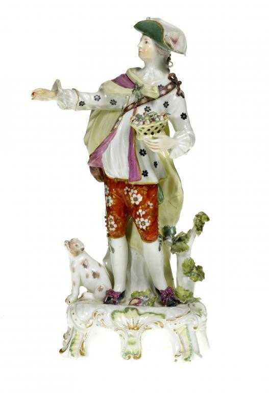 Appraisal: A DERBY FIGURE OF A DRESDEN SHEPHERD in green and