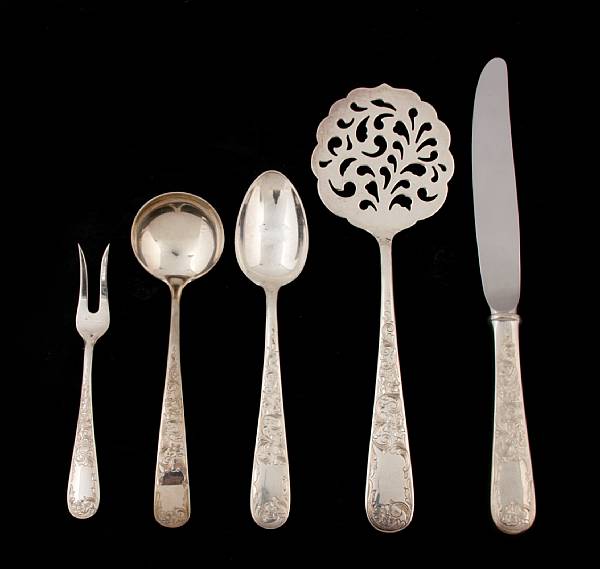 Appraisal: A sterling flatware set with a wooden chestS Kirk amp