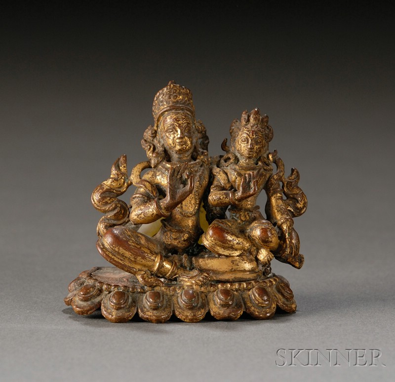 Appraisal: Gilt-bronze Image Nepal th century Shiva and Parvati seated on