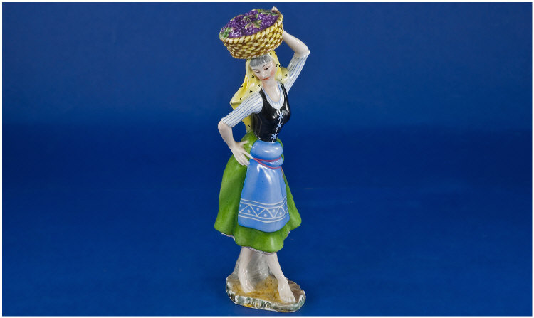 Appraisal: Vista- Alegre 's Pottery Figure Portuguese lady carrying a basket