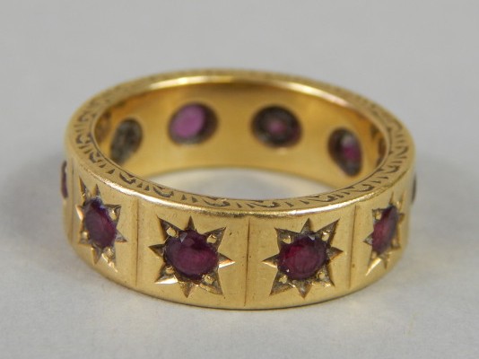 Appraisal: An ct gold garnet ring the eternity ring set with