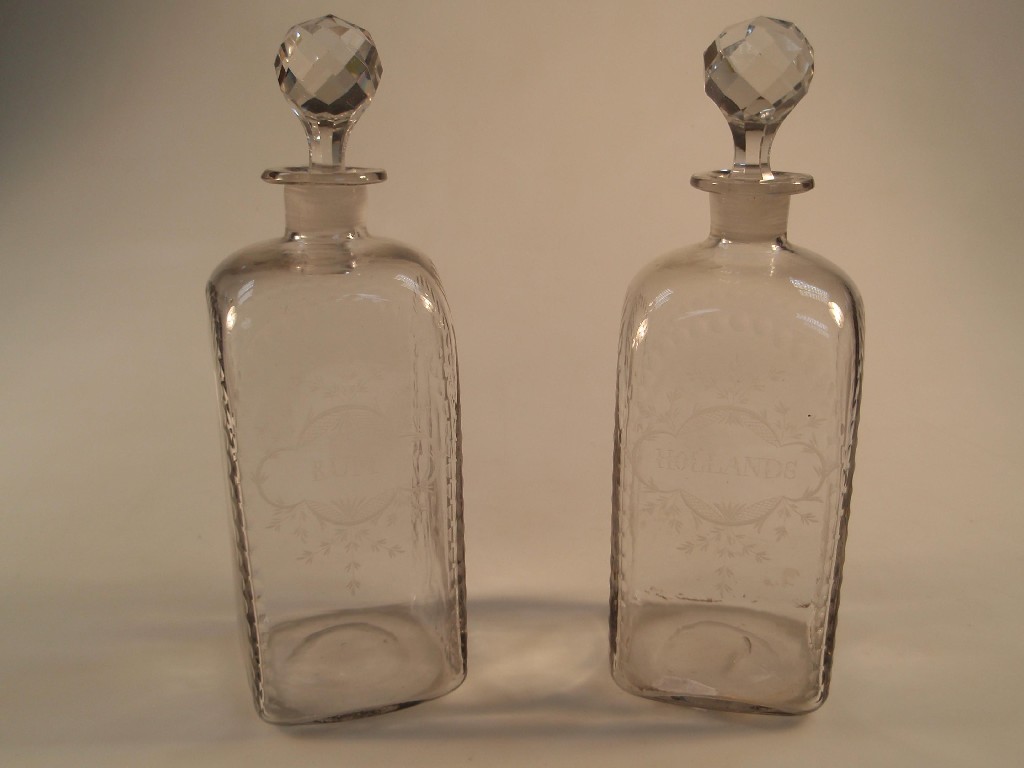 Appraisal: A pair of George III engraved decanters of rectangular shouldered