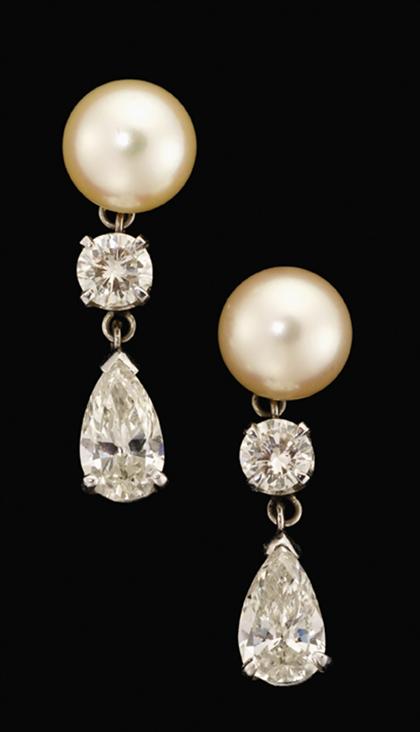 Appraisal: karat white gold diamond and pearl drop earrings Each earring