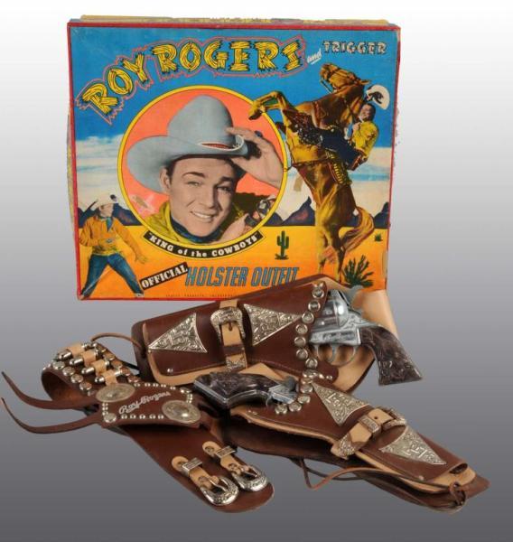 Appraisal: Roy Rogers Toy Double Holster Gun Set Description Includes original