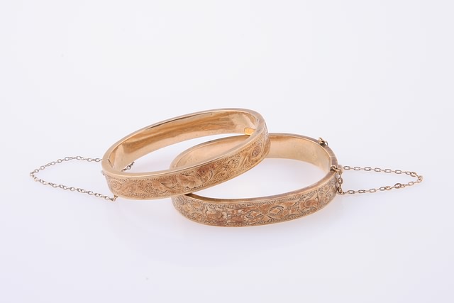 Appraisal: KY mm wide etched hinged bangles x mm inner dimensions