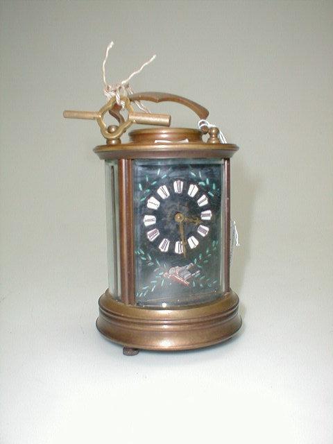 Appraisal: A brass cased carriage clock of circular form with a