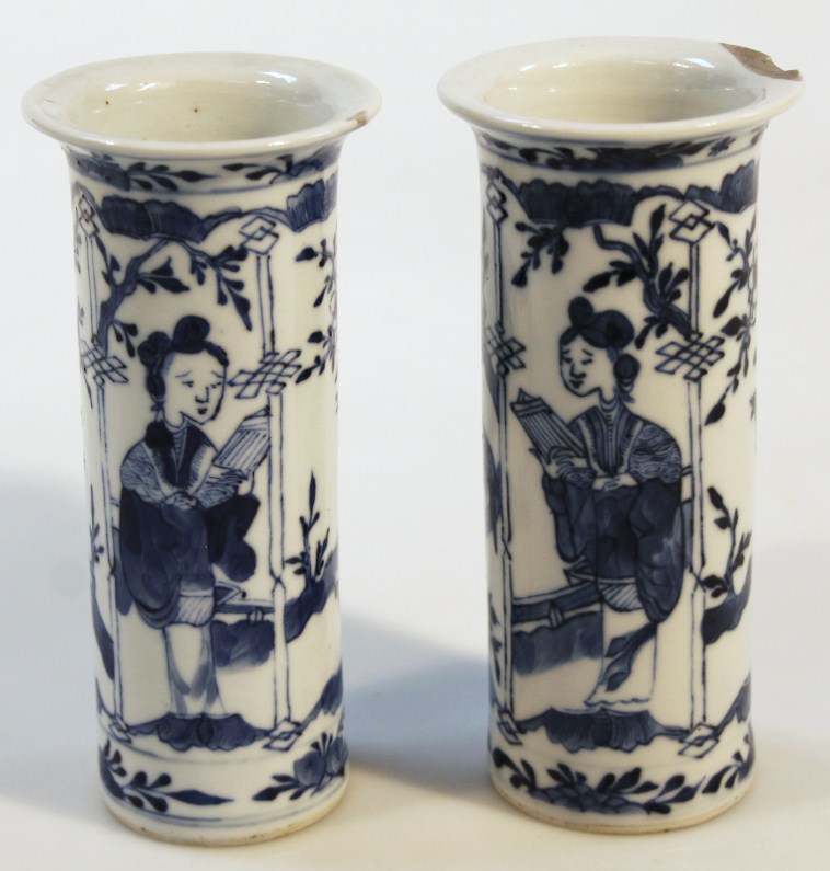 Appraisal: A pair of Chinese blue and white vases each cylindrical