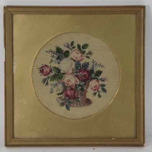 Appraisal: A needlework picture sewn with a basket of flowers cm