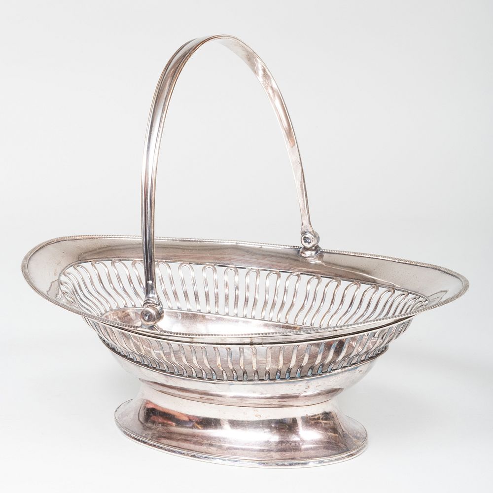 Appraisal: Sheffield Plate Oval Cake Basket x x in over handle