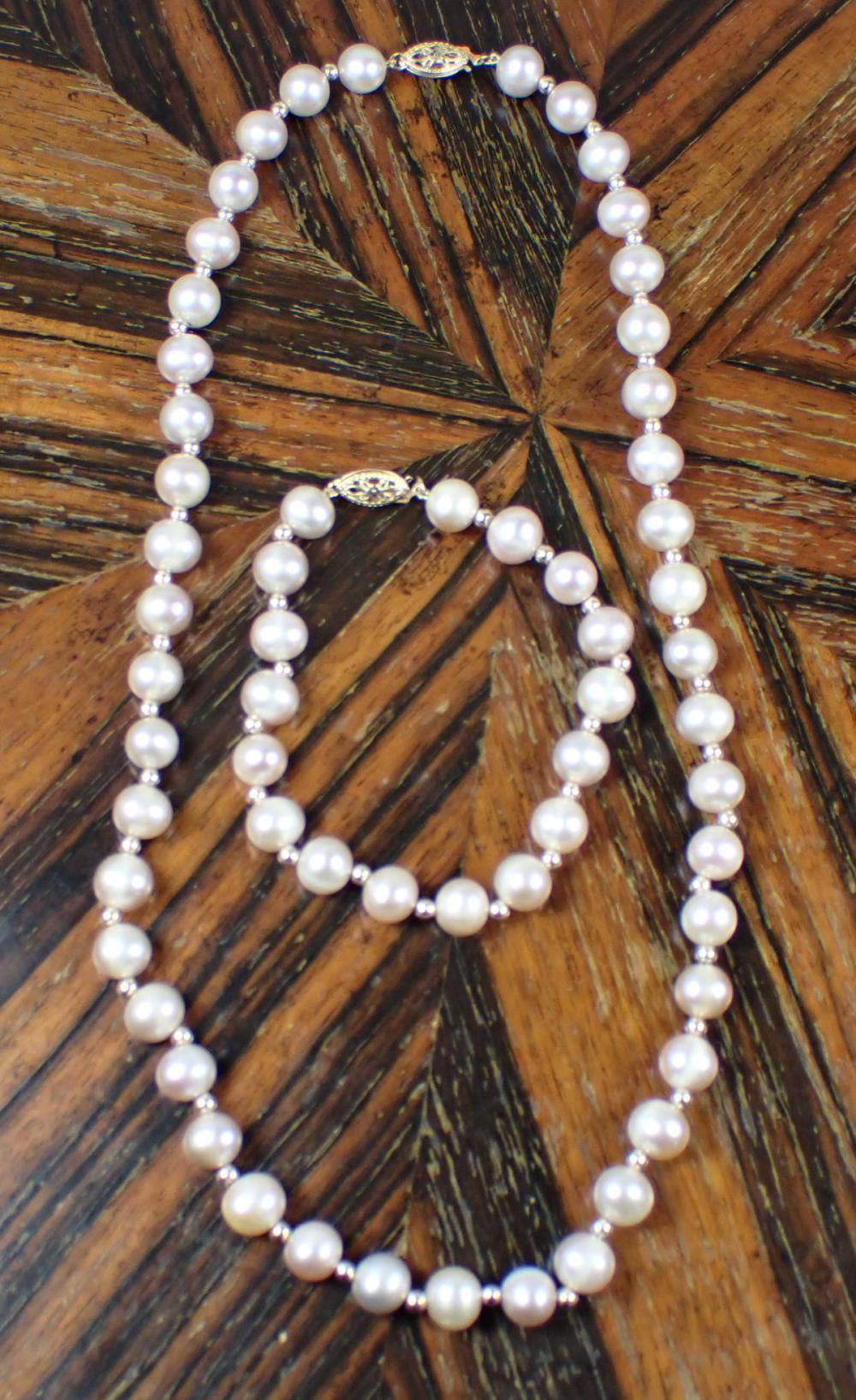 Appraisal: PINK PEARL AND FOURTEEN KARAT GOLD NECKLACE AND BRACELET SET