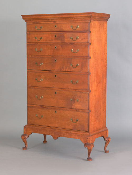 Appraisal: New England Queen Anne figured maple chest on frame th