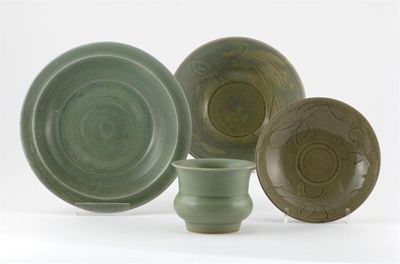 Appraisal: Chinese celadons Comprising a zhadou six bowls three carved with