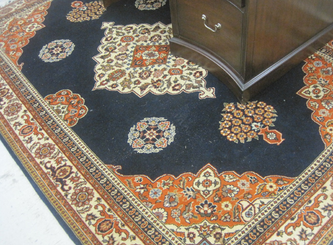 Appraisal: HAND KNOTTED ORIENTAL CARPET Indo-Persian featuring a flower-filled central medallion