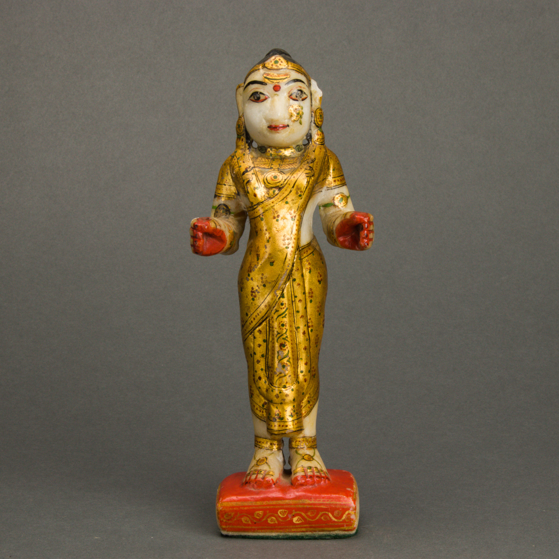 Appraisal: SOUTHEAST ASIAN PAINTED MARBLE FIGURE Southeast Asian painted marble figure