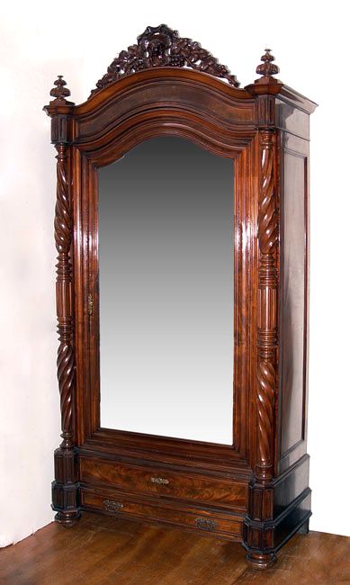 Appraisal: FINE MAHGOANY SINGLE DOOR MIRROR FRONT ARMOIRE Carved crest full