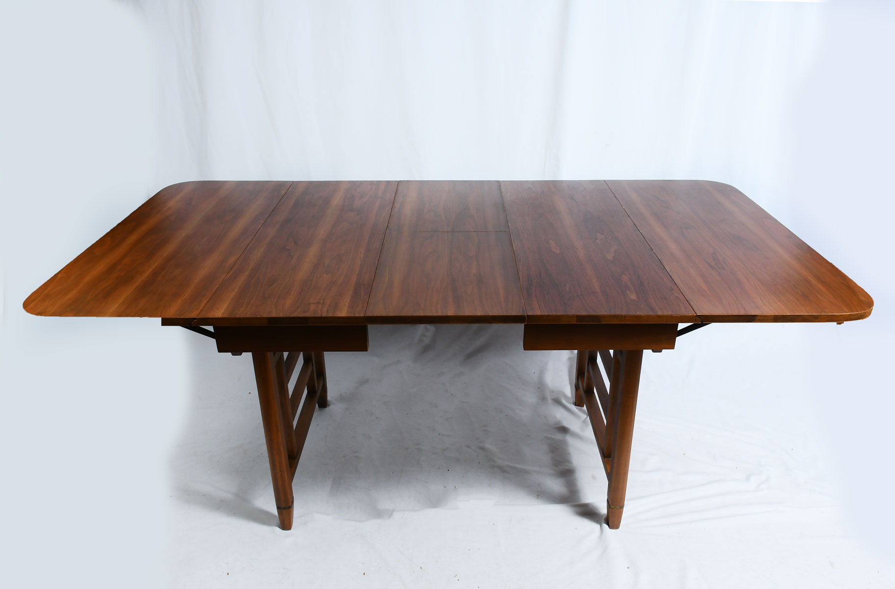 Appraisal: VINTAGE TEAK DROP-LEAF DINING TABLE Having a self-contained leaf with