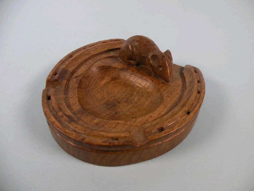 Appraisal: Robert Mouseman Thompson A carved oak ashtray in the form