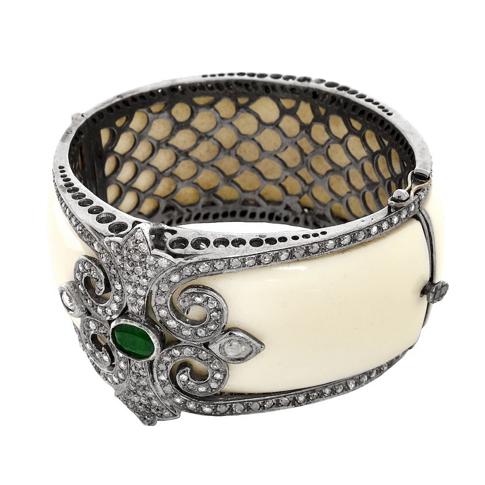 Appraisal: Diamond Emerald and K Gold Bangle Antique style Diamond Oval