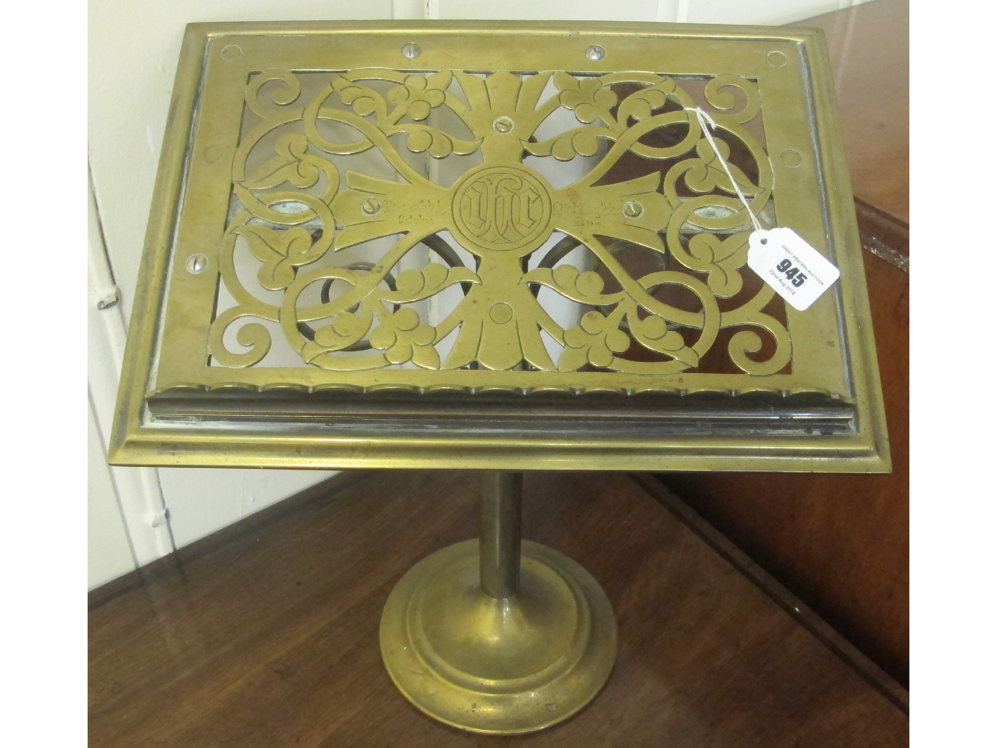 Appraisal: A brass lectern presented in