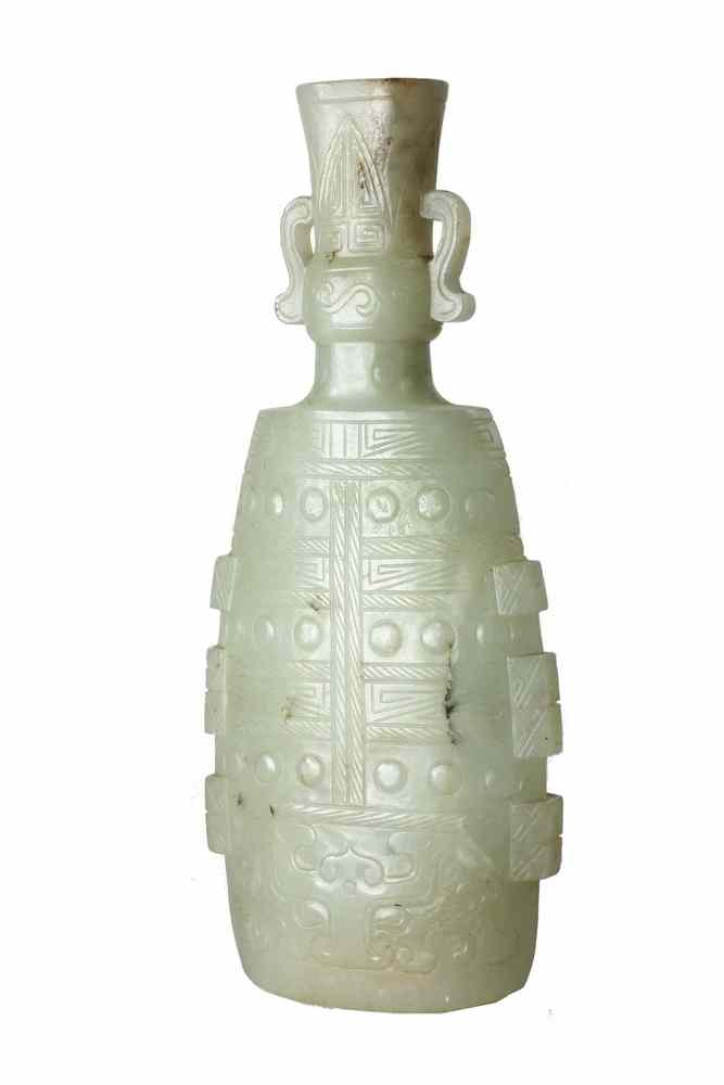 Appraisal: JADE CARVING - Early Chinese bottle shaped bell form jade