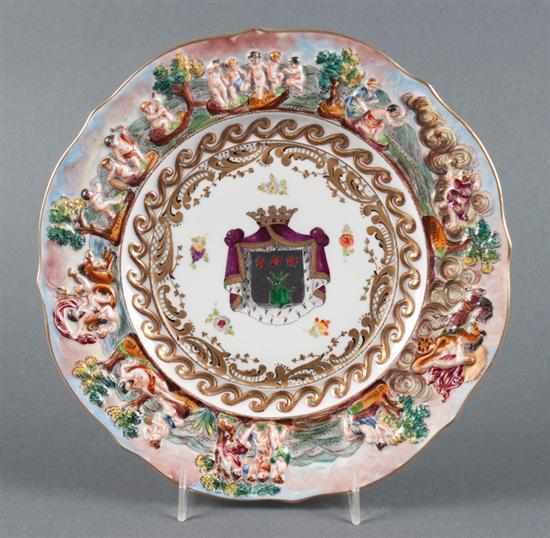 Appraisal: Capodimonte porcelain armorial cabinet plate border with putti and mythological