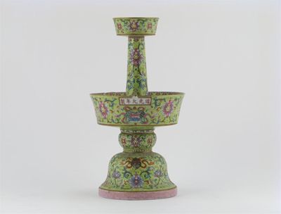 Appraisal: A Chinese famille rose altar candlestick decorated with scrolling lotus