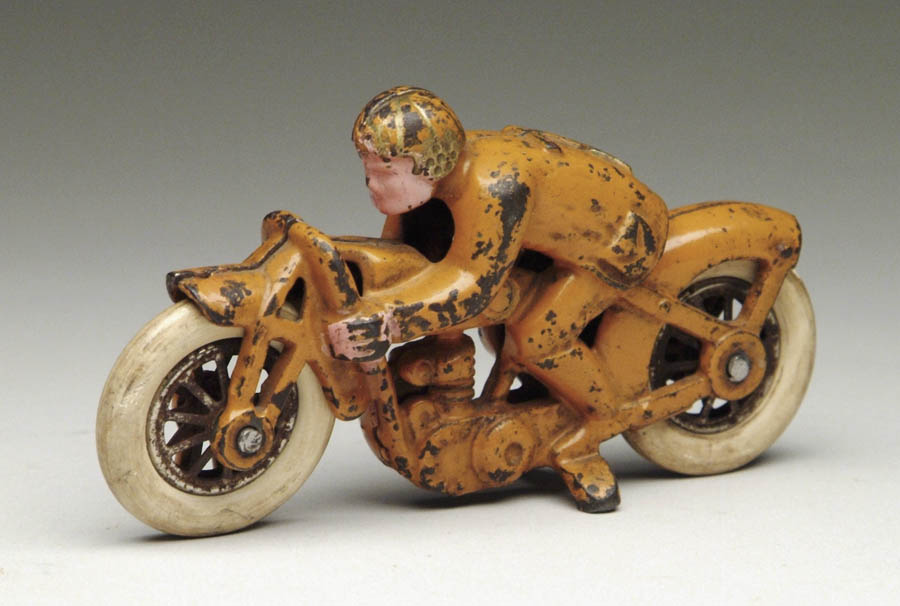 Appraisal: HUBLEY HILLCLIMBER MOTORCYCLE Orange bike with figure crouched over With