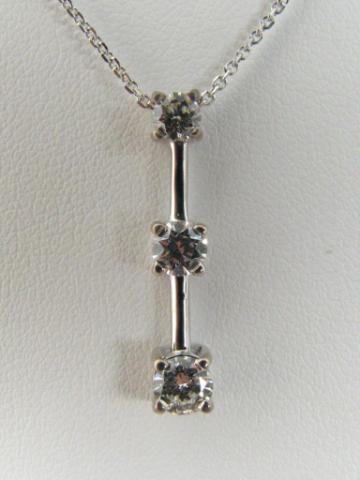 Appraisal: K white gold three diamond pendant ct ct and ct