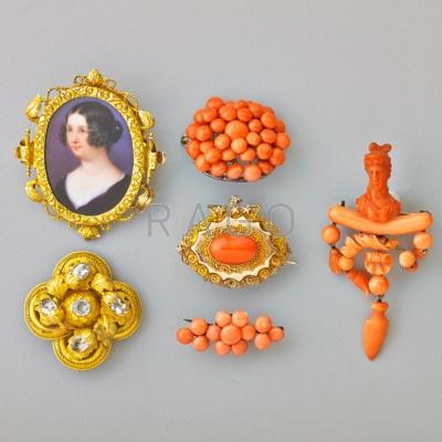 Appraisal: SIX VICTORIAN BROOCHES INCLUDES CORAL Carved figural coral girandole brooch