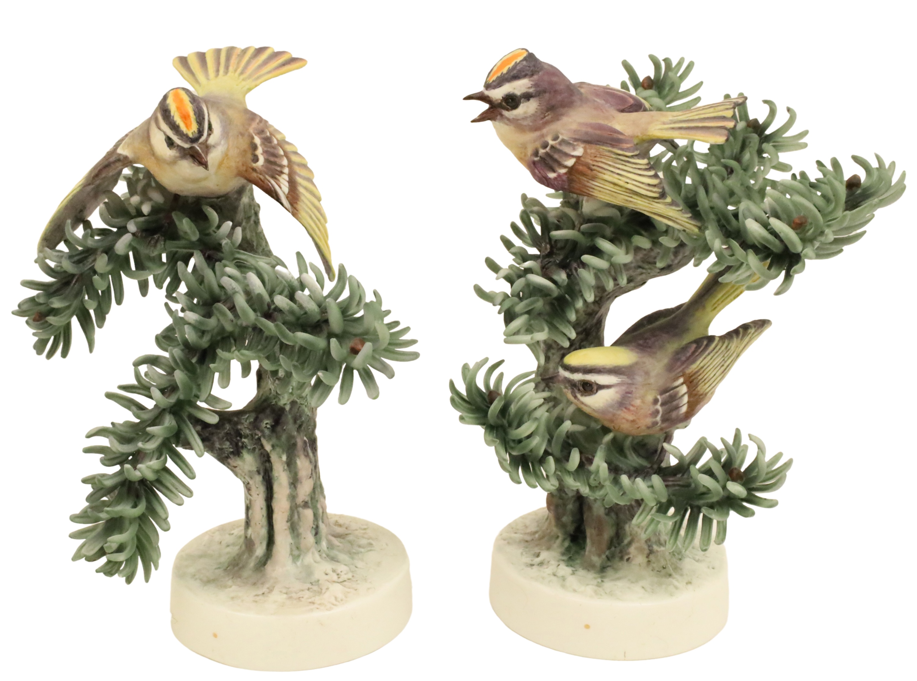 Appraisal: GOLDEN CROWN KINGLET BY DOROTHY DOUGHTY Pair of porcelain models