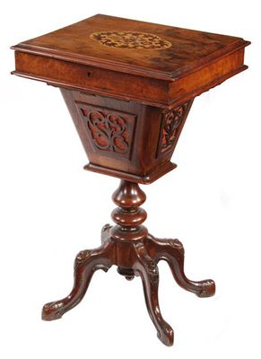 Appraisal: A Victorian walnut sewing table the hinged top inlaid a