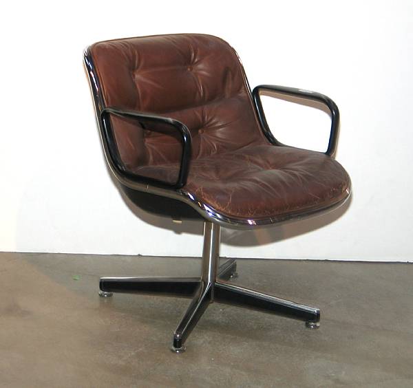 Appraisal: A pair of Contemporary chrome and leather swiveling armchairs second