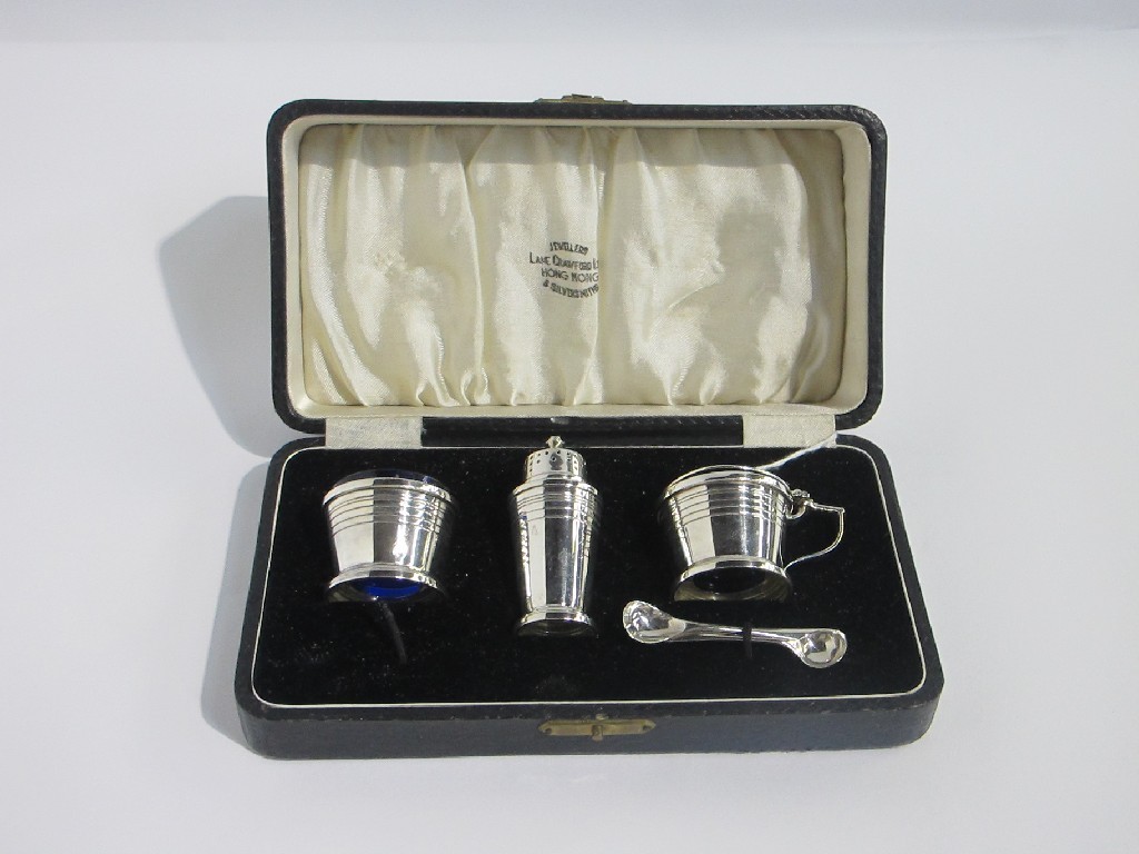 Appraisal: A cased three piece silver condiment set Birmingham