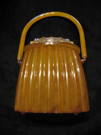 Appraisal: Butterscotch Bakelite Purse Basket shaped bakelite purse in traditional opaque