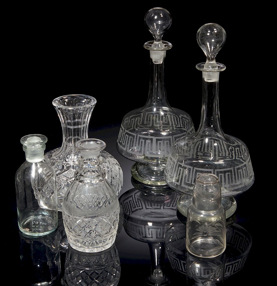 Appraisal: Glass Carafes Bottles Lot of four stoppered glass carafes only