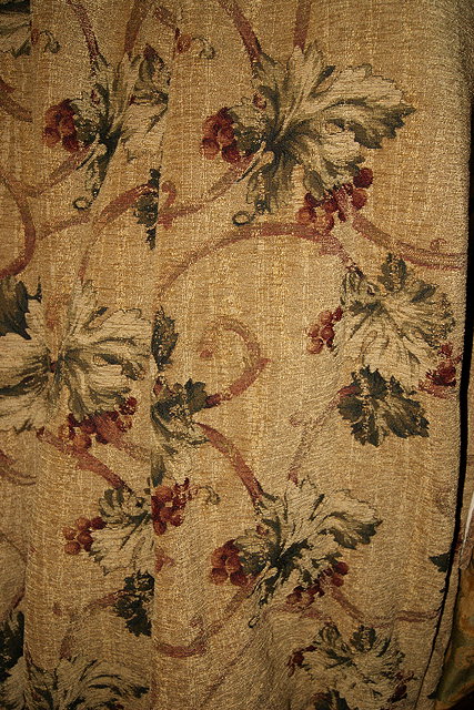 Appraisal: A PAIR OF CURTAINS with floral designs on a beige