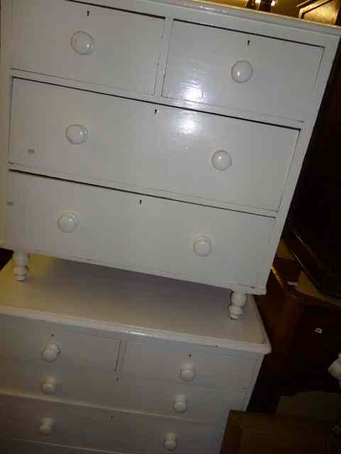 Appraisal: A WHITE PAINTED CHEST of two short and three long