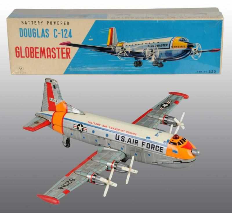 Appraisal: Tin Military Transport Airplane Battery-Op Toy Description Japanese Working Made