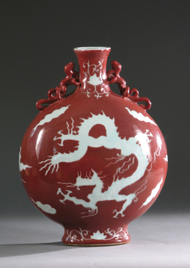 Appraisal: HEAVY CHINESE PORCELAIN OVOID FOOTED VASE with figural applied dragon