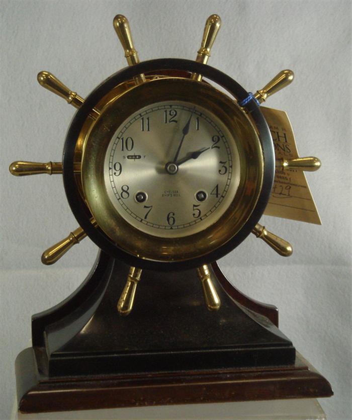 Appraisal: Chelsea ships wheel clock on mahogany base dial very nice