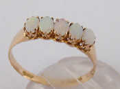 Appraisal: A carat gold five stone opal ring size O approx