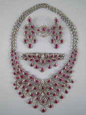 Appraisal: A white metal tests carat gold ruby and diamond parure